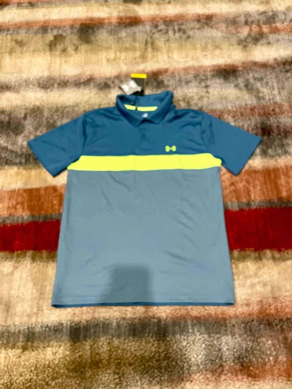 Under Armour Boys' Blue Polo with Neon Yellow Chest Stripe